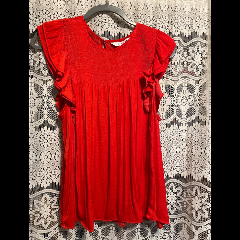 Cute red ruffle top!